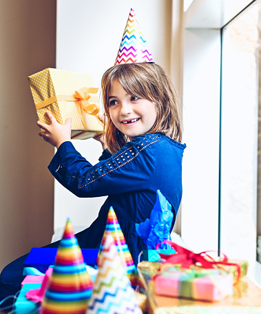 Happy little girl celebrating a birthday