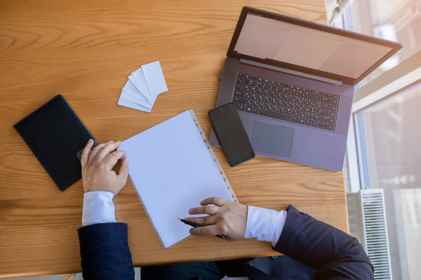istock Young happy businessman working in business centre. Work hub concept 1388600966