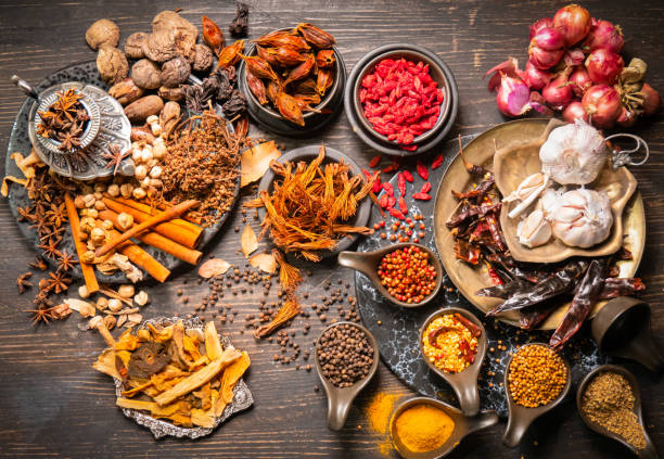 istock Top view Herbs for cooking, such as red curry, stewed or tom yum soup, such as shallots, garlic, dried chilies, chili peppers, coriander balls, goji berries or goji berries, turmeric powder, turmeric. 1388604890