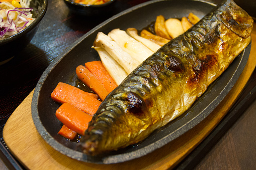 Fried mackerel with vegetables in Thailand