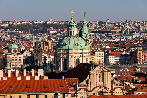 St. Nicholas church and panorama of Prague historical and new building. Czech republic.
