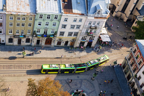 market square in the old town. tourists walk around the city center. tram top view - editorial built structure fountain town square imagens e fotografias de stock