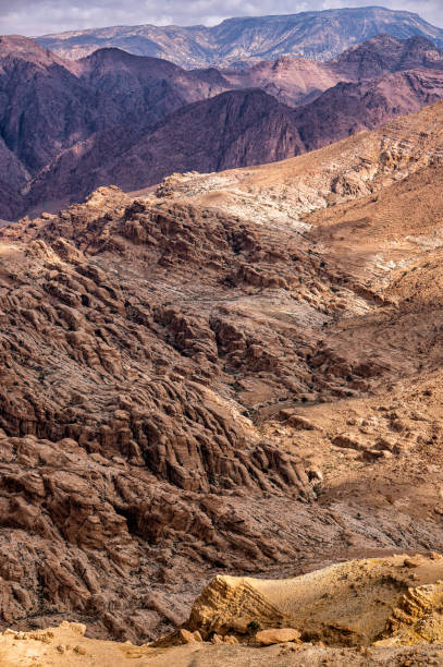 istock Awesome desert mountains landscape. Wadi Ghuweir, Jordan. 1388607163