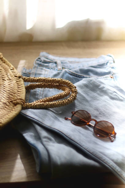 istock Vintage Jeans, Straw Bag and Sunglasses 1388607171