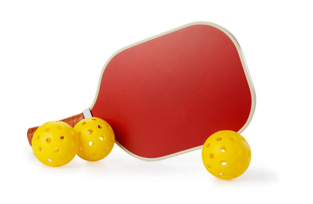 istock Pickleball Paddle and Balls Isolated on a White Background 1388607298