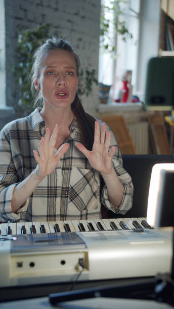 istock The music teacher gives remote singing lesson 1388612662