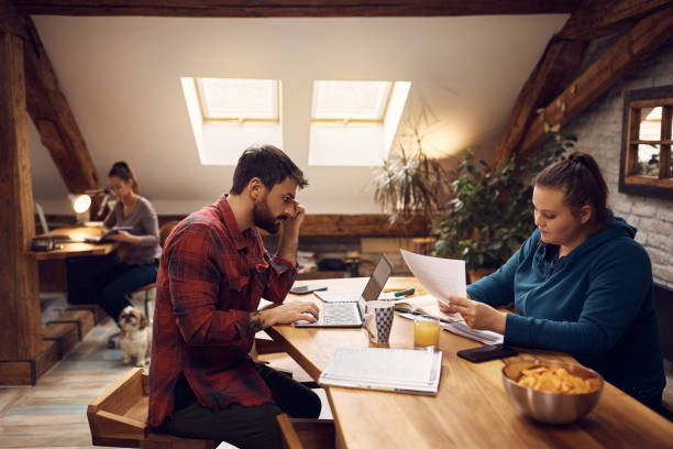 istock Group of university roommates studying for upcoming exams. 1388616317