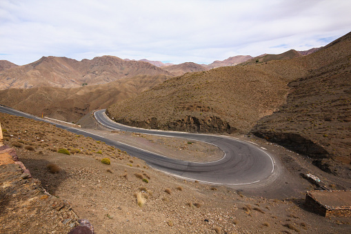 Dades, Morocco-September 26, 2013: The winding roads of Dades Valley. The roads pass through the earth-coloured mountains.