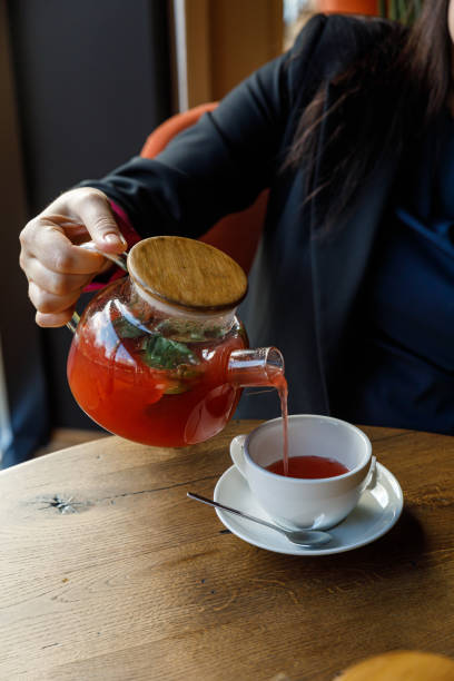 istock teapot with tea on a wooden table 1388625361