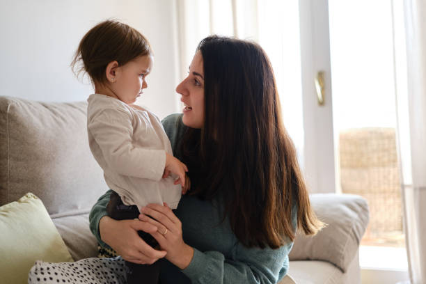 istock Mother talking and scolding her little daughter while spending time together at home. 1388626032