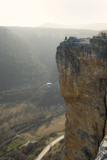 istock Tourist cliff mountain. 1388629282