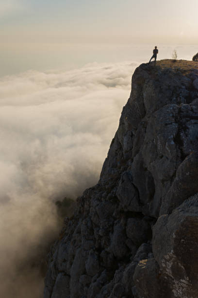 istock Tourist cliff mountain. 1388630294
