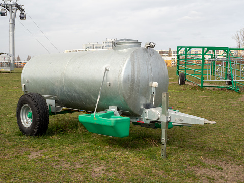 Barrel for watering cattle. Watering place for cattle