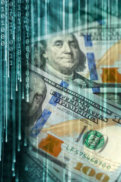 Photo of Financial Technologies - binary code background with dollar bills