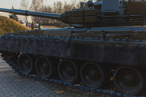 Close-up of tractor tracks on old equipment