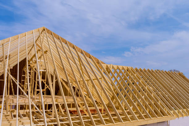 istock Framing beam of new house under construction top view 1388634357