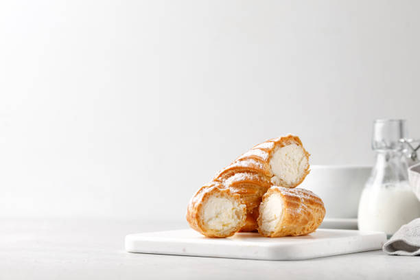istock ake in the section. Cake ring with cottage cheese cream on a white background. Copy space 1388635702