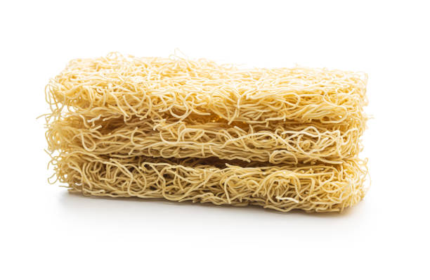istock Instant noodles. Uncooked chinese noodles 1388636736