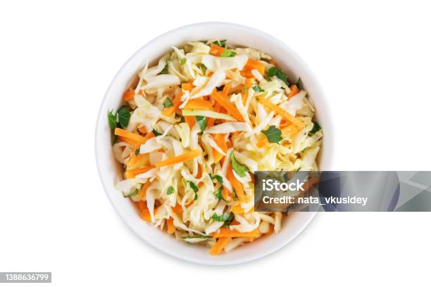 Cabbage Carrot Salad In A Bowl On A White Isolated Background Stock Photo - Download Image Now