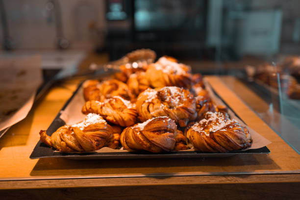 istock freshly baked Cinnamon rolls buns at modern cafe 1388640731