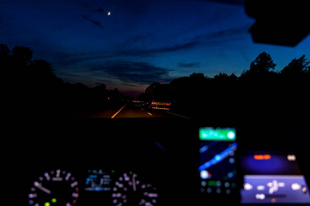istock Midnight Driving Business Trip Navigating Along Dark Expressway 1388641758