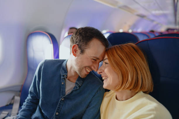 istock Couple traveling by plane 1388641812
