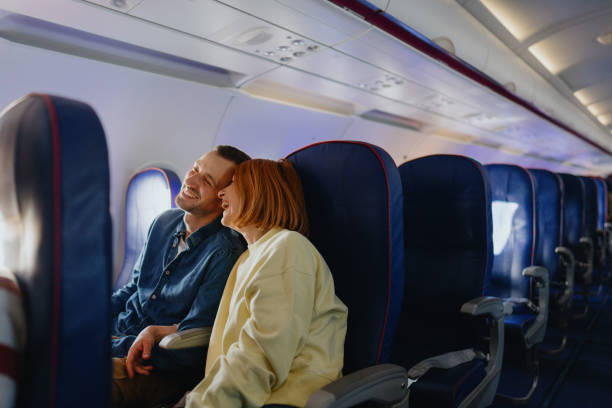 istock Couple traveling by plane 1388641821