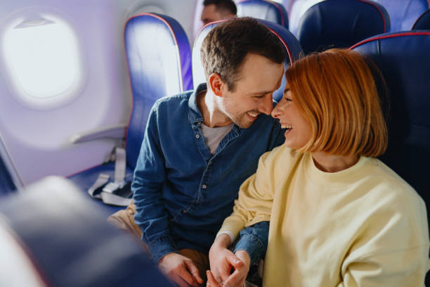 istock Couple traveling by plane 1388641854