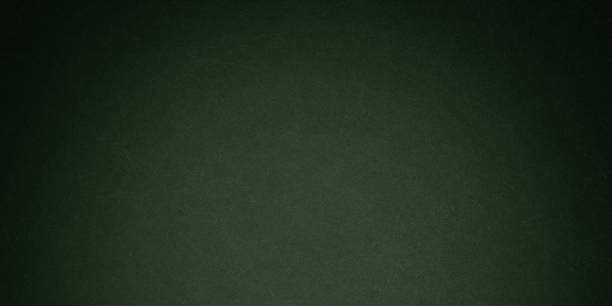 istock Elegant dark emerald green background with black shadow border and old vintage grunge texture design 1388641862