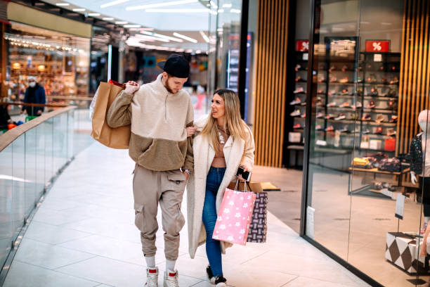 istock Friends spending time together in Shopping Mall 1388641957