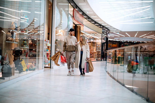 istock Friends spending time together in Shopping Mall 1388641980