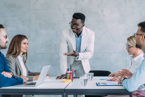 istock Team of professionals during a meeting. 1388642660