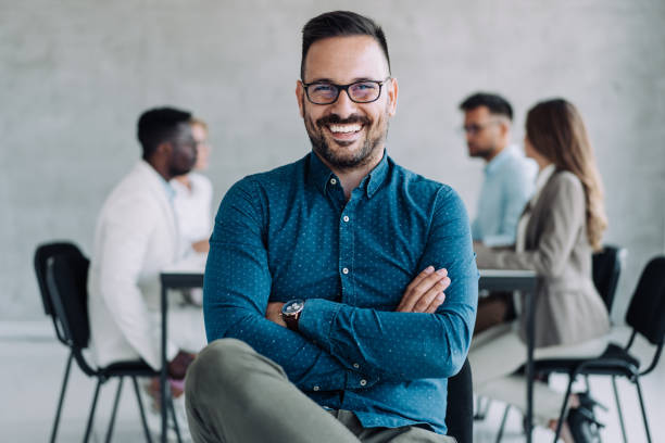 istock Successful businessman in the office. 1388642675