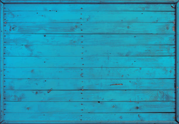 Close up background texture of blue vintage weathered painted wooden planks, rustic style wall panel