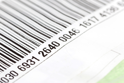 Part of a barcode label, numbers on a product package, object detail, macro, extreme closeup, nobody, shallow dof. Retail, product origin, number, indentification, commerce, economy, business concept