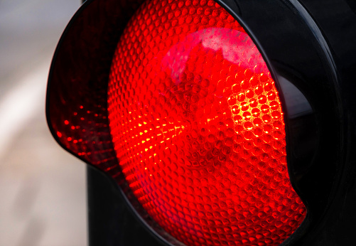 Red light, traffic lights stop signal object macro, detail, extreme closeup, city life, urban area road traffic regulations, law, speeding. Ceasing action, stopping abstract concept, nobody, no people