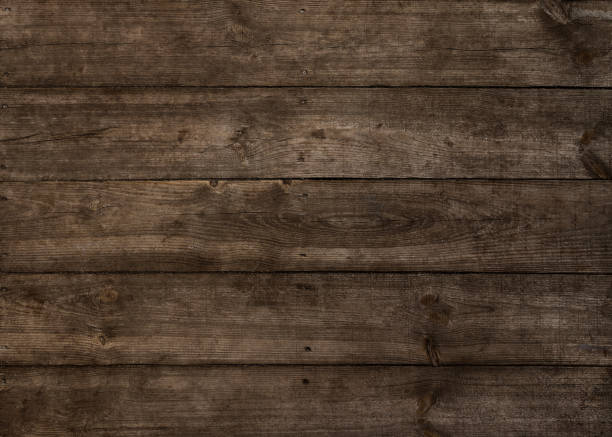istock Old weathered brown wooden background 1388645885