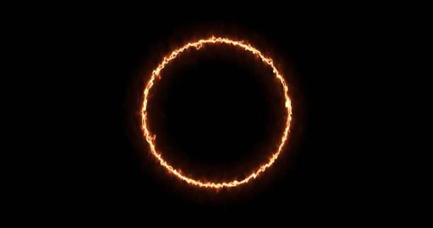 istock Fiery yellow red ring on a black background. Abstract circle of solar flame. 3d image A burning ring of fire gradually appeared and a constant burning in a circle 1388646918