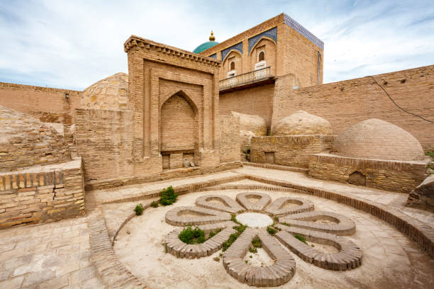 Exterior of an old mosque and madrassa in the khanate of Khiva, Uzbekistan, Central Asia Exterior of an old mosque and madrassa in the khanate of Khiva, Uzbekistan, Central Asia khiva stock pictures, royalty-free photos & images