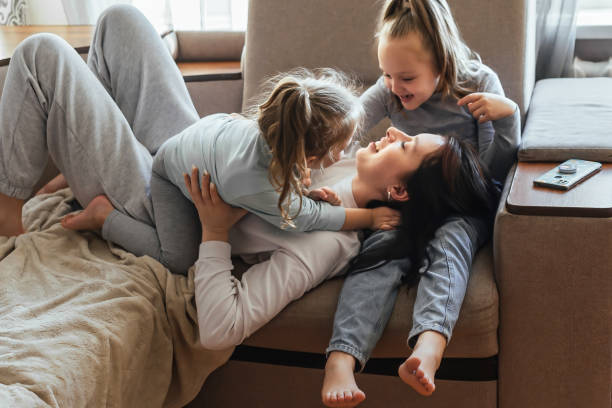 istock Happy family having fun at home 1388652167