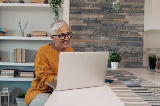 istock Mature woman working from home 1388665924