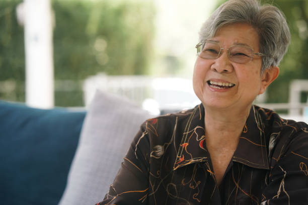 istock old woman resting relaxing in garden 1388666739