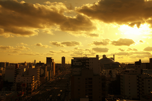 At dusk, which dyes the city of Osaka orange