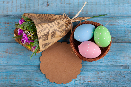 Easter Egg Nest on Blue Vintage Wood