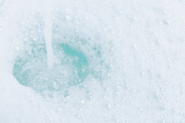 Texture of water. Soap foam bubbles in bathroom