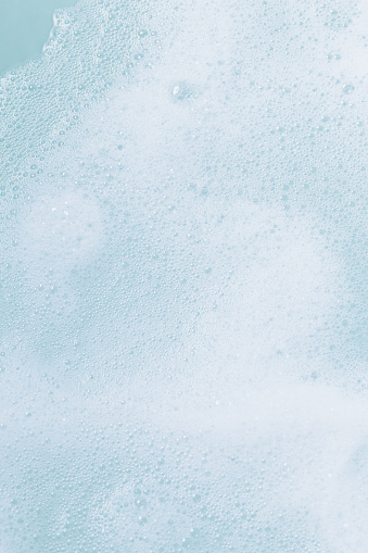 Texture of water. Soap foam bubbles in bathroom