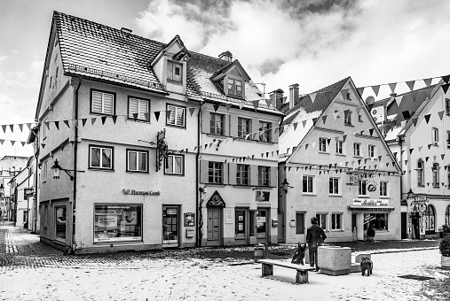 Guenzburg, Germany - January 15, 2017:  old houses at the medieval market place in small town of Guenzburg in Bavaria