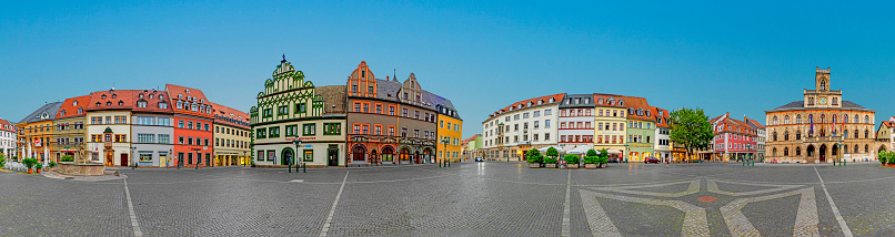 Weimar, Germany - July 28, 2018: panoramic view of old market place in Weimar  with famous city hall.