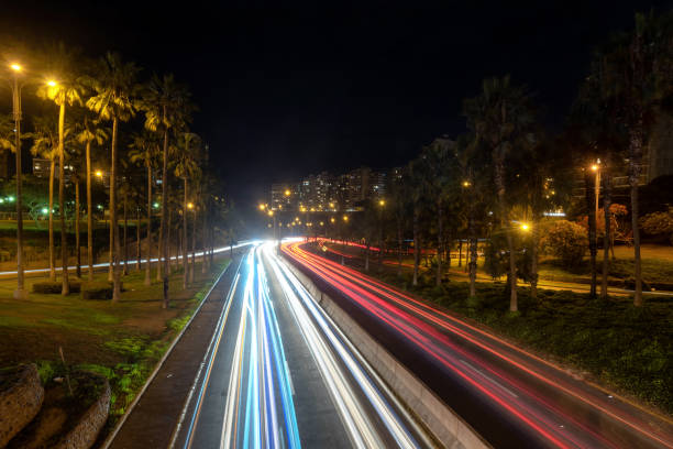 istock Long exposure light trails over a Lima, Peru highway 1388676886