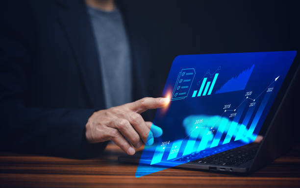 istock Businessman invest on technology virtual screen digital chart trade forex. 1388680788